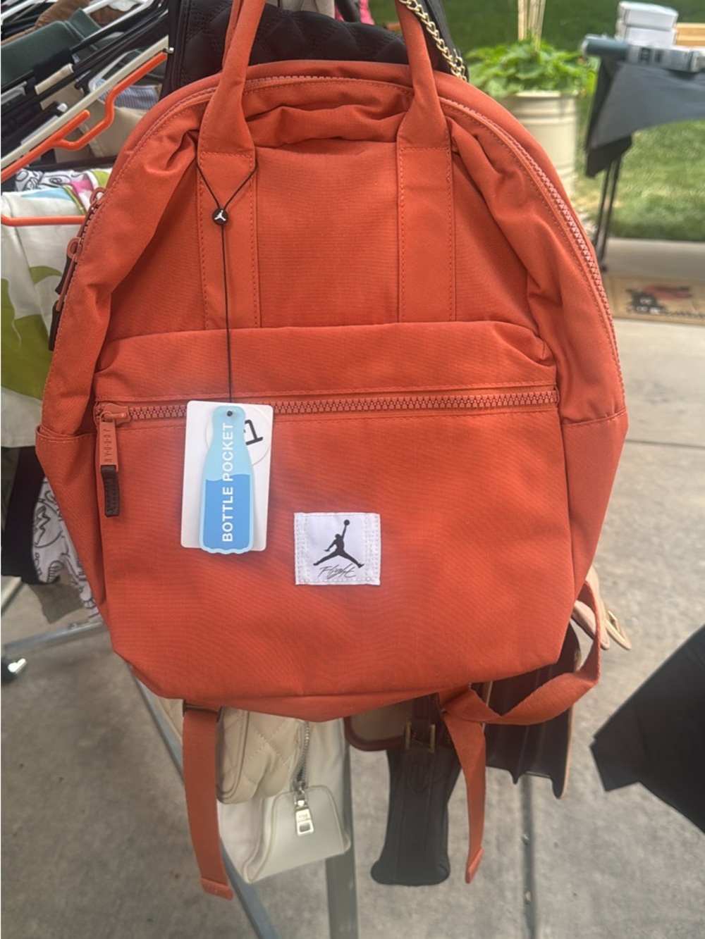 Jordan Orange Canvas Backpack with Front Zip Pocket